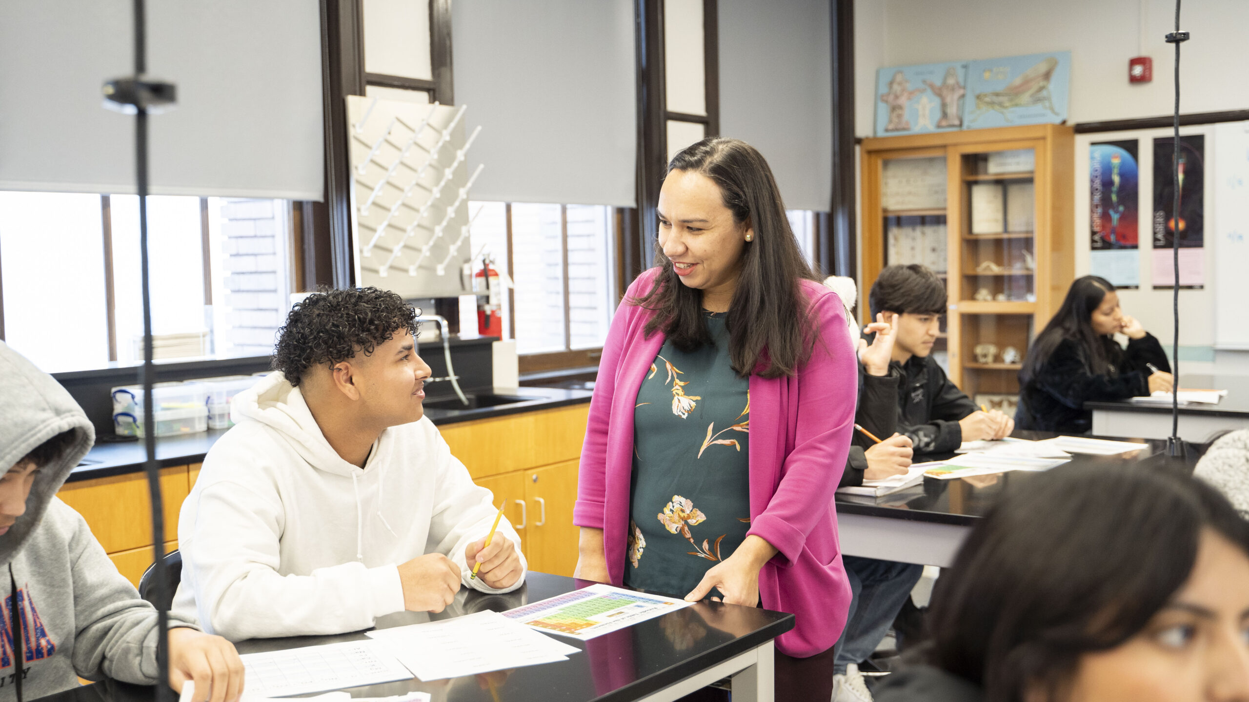 Schurz High School Principal Heidy Moran speaking with student